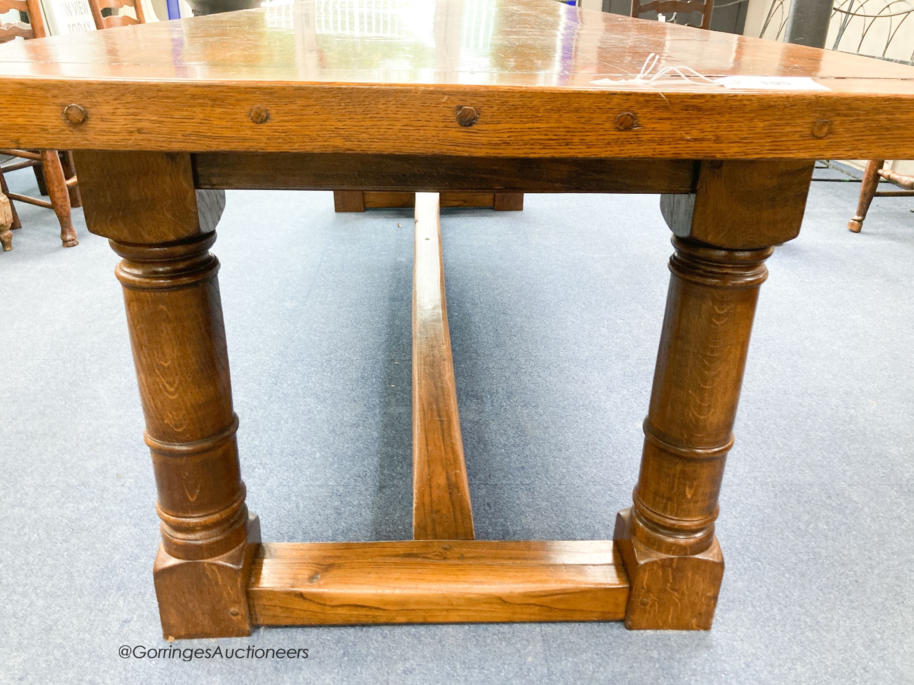 An 18th century style rectangular oak refectory dining table, length 274cm, depth 85cm, height 78cm